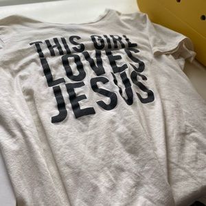 “This girl loves Jesus” white shirt.